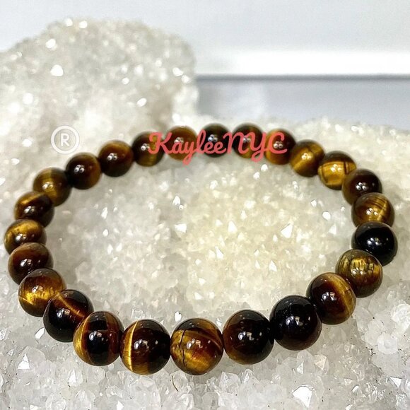 Jewelry - Natural Tiger Eye 8mm 7.5" length
Crystal Healing Stretch Single Bracelet